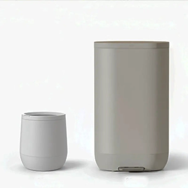 Side-by-side comparison of Lomi 3 smart kitchen composter and Mill food waste bin showing size and design differences.