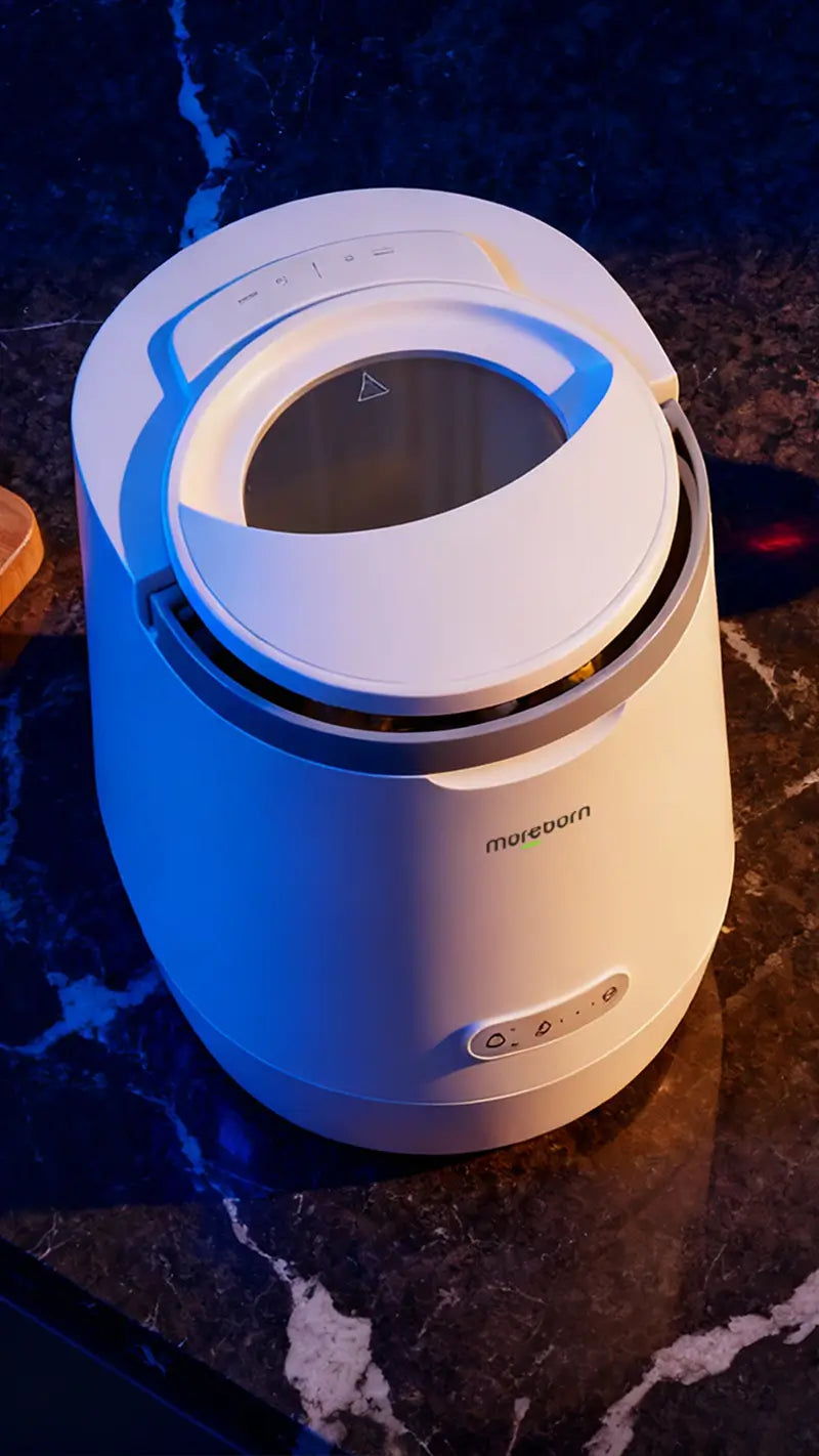 Moreborn Mb4 food recycler featuring a sleek, minimalist design that seamlessly integrates into a luxury kitchen setting, highlighting its quiet operation and premium aesthetic for an eco-conscious lifestyle.
