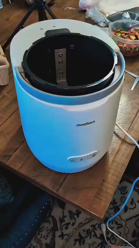 A comprehensive video demonstration of the Moreborn Mb4 smart composter, showing the easy process of pouring kitchen scraps into the removable bucket, its quiet one-button operation, and the final transformation into nutrient-rich organic fertilizer. The video highlights its versatile design for both modern kitchen countertops and covered outdoor patios.