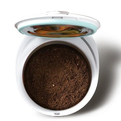 Interior view of MB12 bucket showing 100% finished fermentation where all food waste is fully transformed into premium, odor-free brown organic fertilizer.